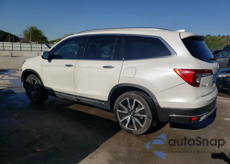 2019 Honda Pilot Touring z USA, uszkodzony, nr VIN 5FNYF5H6XKB037214
